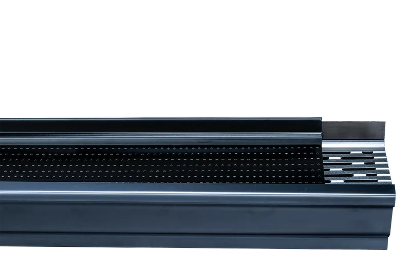 Installer positioning an Alu-Rex continuous hanger gutter guard